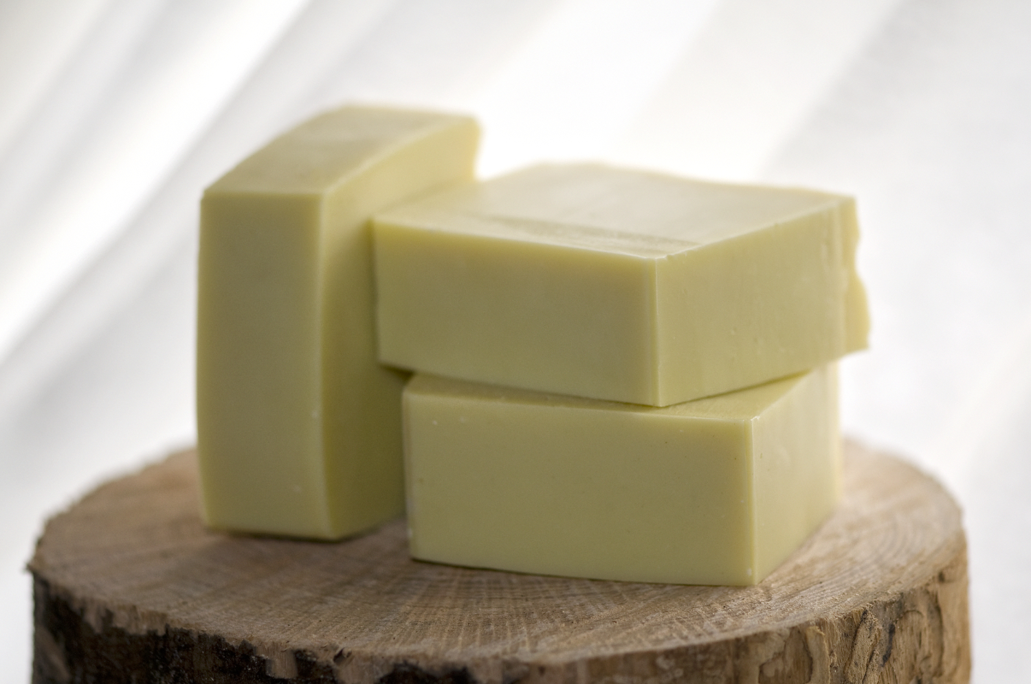 Handmade soap bars on wood