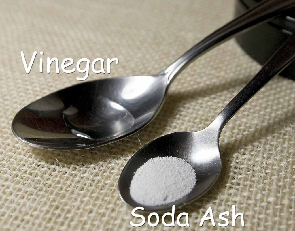 Vinegar and soda ash powder in spoons